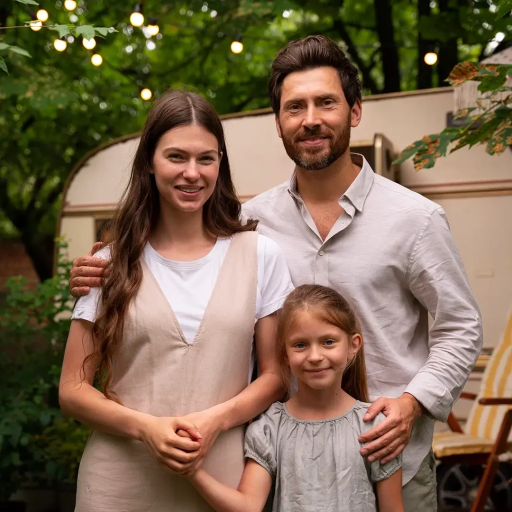 parents daughter spending time together while wearing linen clothing